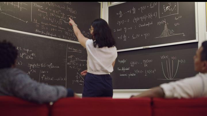 scientists at blackboard